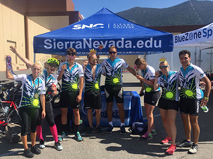 Sierra Nevada College Team Eagle at the 2017 Tour de Tahoe, student riders celebrate at the finish line