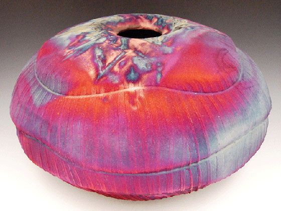 raku purple and orange pot by ceramicist Don Ellis