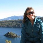 Caitlin Burrows, English major, sitting above Emerald Bay in Lake Tahoe