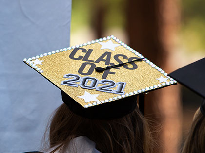 a Sierra Nevada University 2021 graduates decorated her mortar board