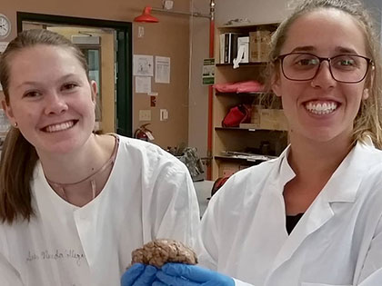 Olympic athlete and SNC Tahoe student Maddie Bowman gets hands on during a science lab.