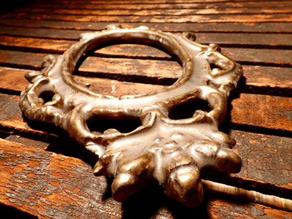 artist Hannah Fridholm, image of a gilded ceramic and found object piece for her BFA exhibition 'Armor's Ashes'