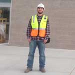 Jordan Koucky, Business major, in construction attire
