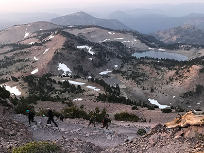 Lassen NP - students navigate the switchbacks on a sunrise hike up Mt. Lassen