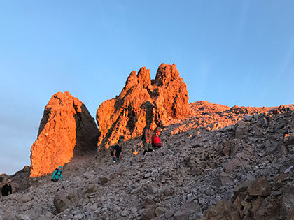 Lassen NP - students on a sunrise hike up Mt. Lassen, a plug-dome volcano