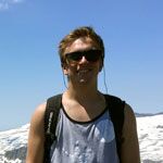Cole Lyon, free skiier at SNC, takes a break from his Ski Business & Resort Management Homework by hiking in the Tahoe Basin
