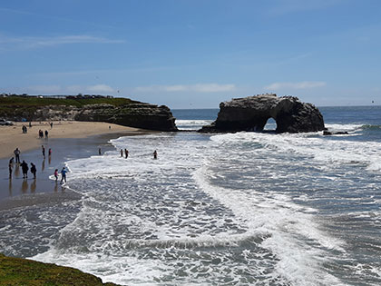 A view of the cove and bridge rock formation at Natural Bridges State Beach in Sant Cruz, during a Sierra Nevada College science trip.