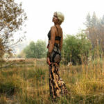 Art and Psychology major, Justine Nelson explores a grass field