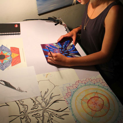 Art and Psychology major, Justine Nelson works on some 2D artwork