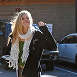 Science major Makenzie OConnor waves to camera