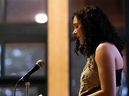 Sierra Nevada College art and creative writing student Nikki Sardelli performing at the 2019 Tahoe Slam, held at Sierra Nevada College during National Poetry Month