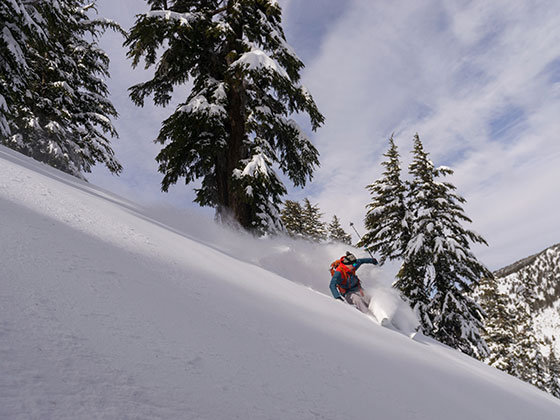 Skiier in powder on Incline Peak. Photo by SNC Tahoe Digital Arts and Outdoor Adventure Leadership major Garrett Ramos.