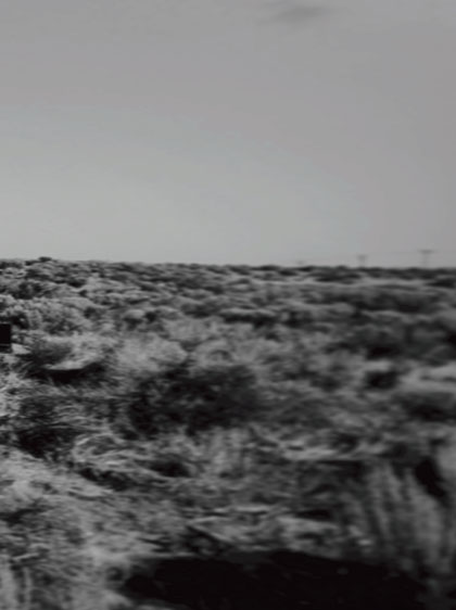 black and white photograph of barren landscape - THIS SIDE OF LOST by artist Hasler R Gomez