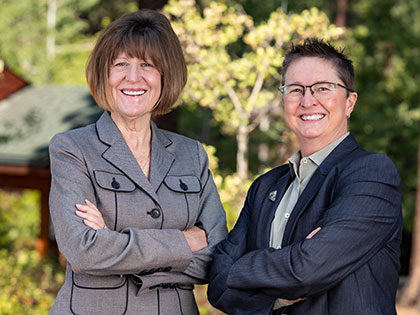 Executive Transition Team leads Sue Johnson and Dr. Jill Heaton on the SNU campus