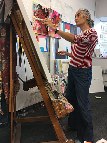 painter, dancer, and ceramic artist Sharon Virtue at work in her studio