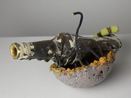 Ian Wieczorek, Bachelor of Fine Arts, displays ceramic piece titled Caught