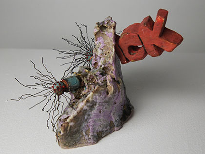 Ian Wieczorek, Bachelor of Fine Arts, displays ceramic piece titled ICK