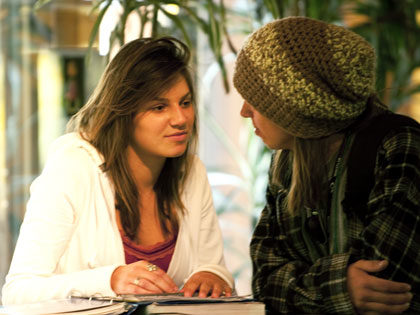 two female students deep in conversation