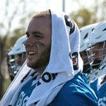 Robbie O'Hare, Business major and goalie for SNC's Men's Lacrosse team, watches the field