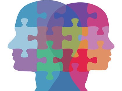 image of heads made of puzzle pieces illustrates that psychology majors learn to solve the puzzle of how the mind works