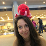 Teresa Rafello, Psychology major, plays around while waiting at the airport