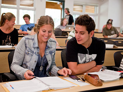 Collaborating students work on assignments at SNU Tahoe
