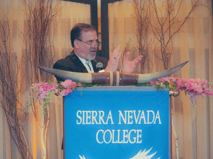 Sierra Nevada College's president Alan Walker celebrates at the 2018 Summer Gala hosted at Lake Tahoe