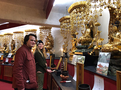 SNC students Madison Johnson and Brett Sikora with sculpture models proposed for the Sekai Heiwa Kannon (world peace Buddha Statue)