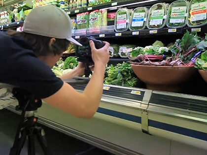 Digital Arts and Journalism student gets video footage of a local grocery store for a project