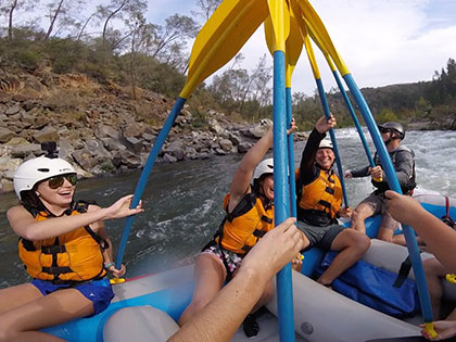 high fives on a whitewater rafting and camping trip on the South Fork of the American River